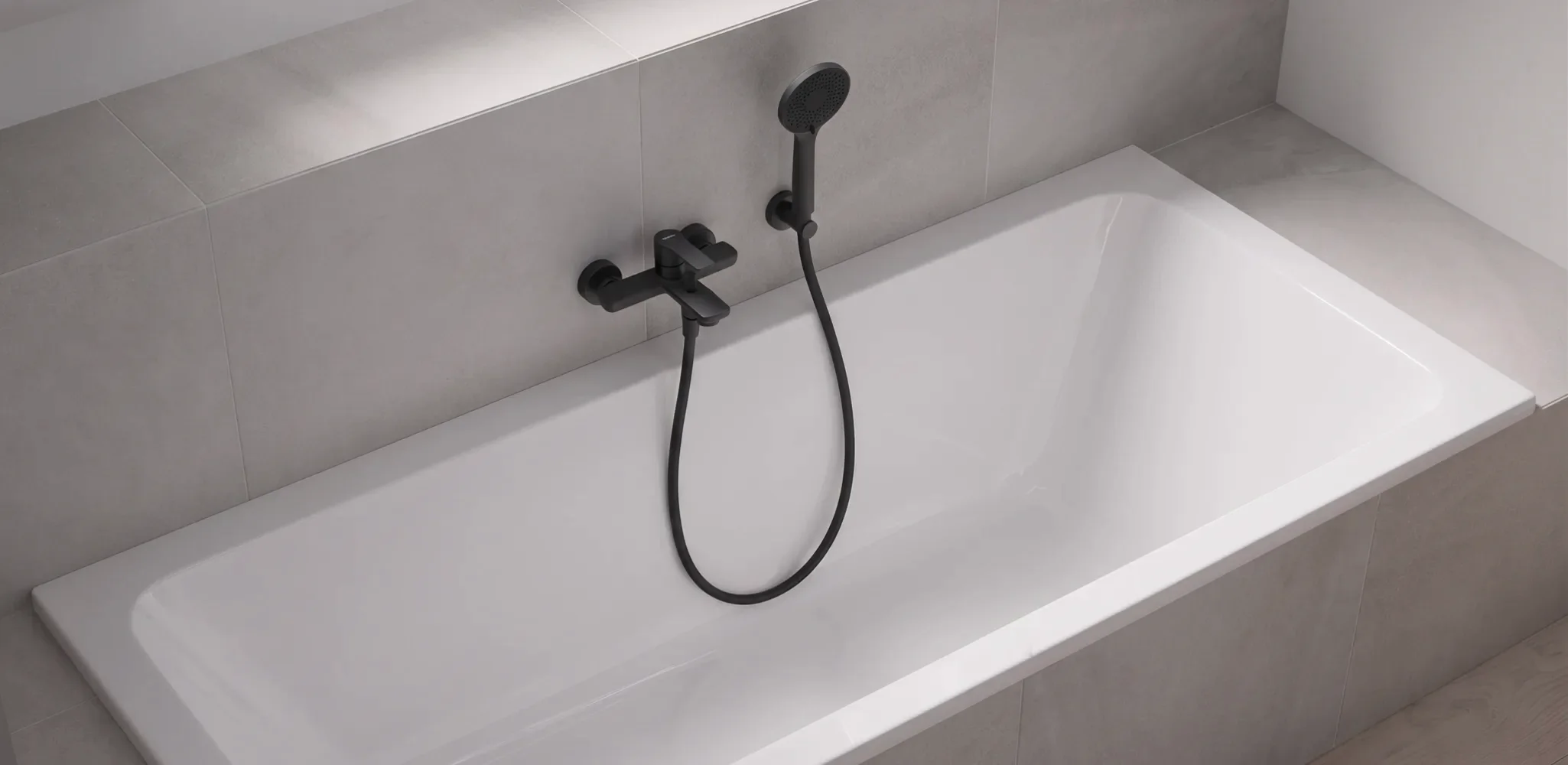 A newly set bathtub with a tiled surround