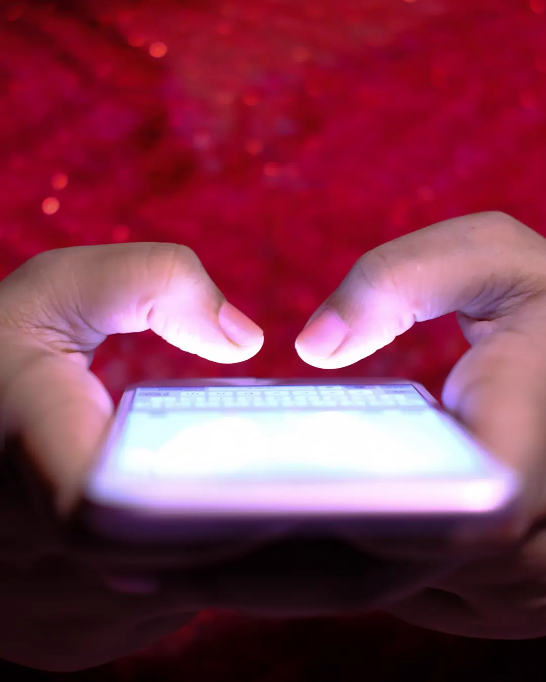 Two hands holding a smartphone with the screen lit, the way most estimate requests reach us