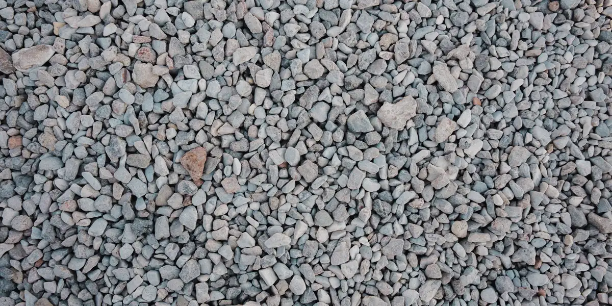 Top view of a compacted gravel base, driveway cost