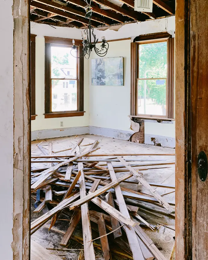 A doorway stripped to the framing during a demolition, the point where a remodel gets decided